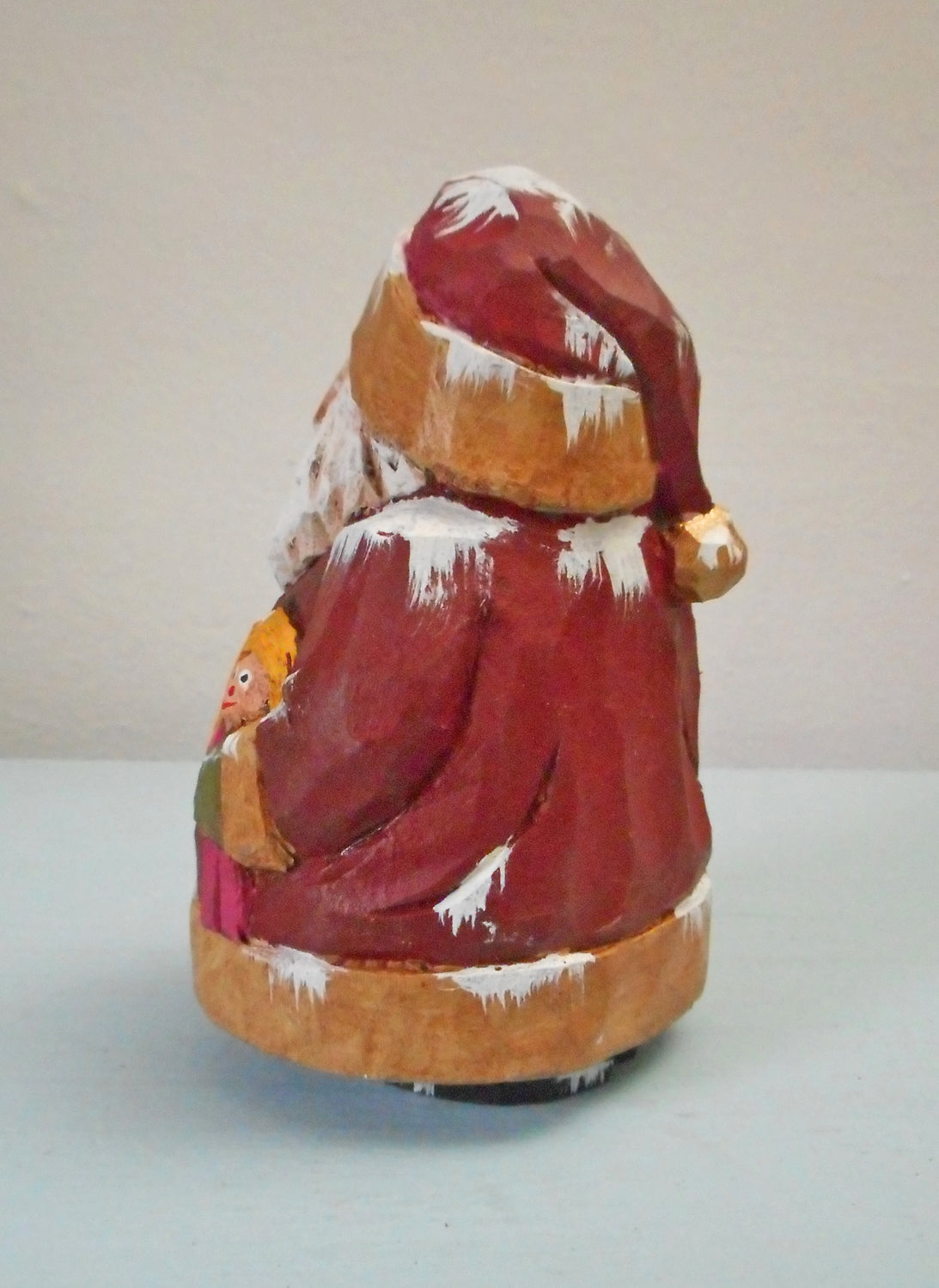 Wooden Chubby Santa Claus with doll