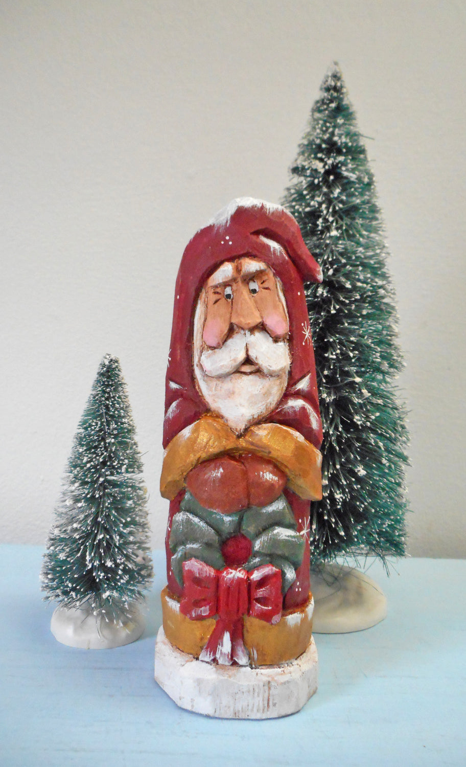 Hand Carved Santa Claus with Wreath