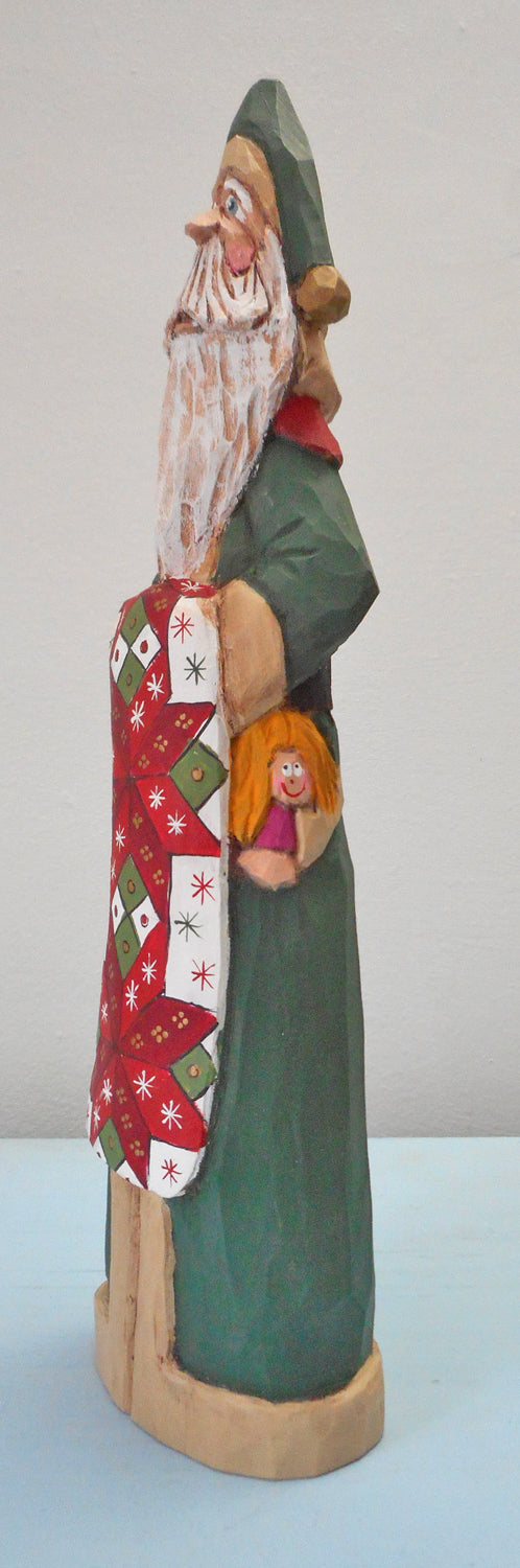 Hand Carved Father Christmas Santa with Quilt