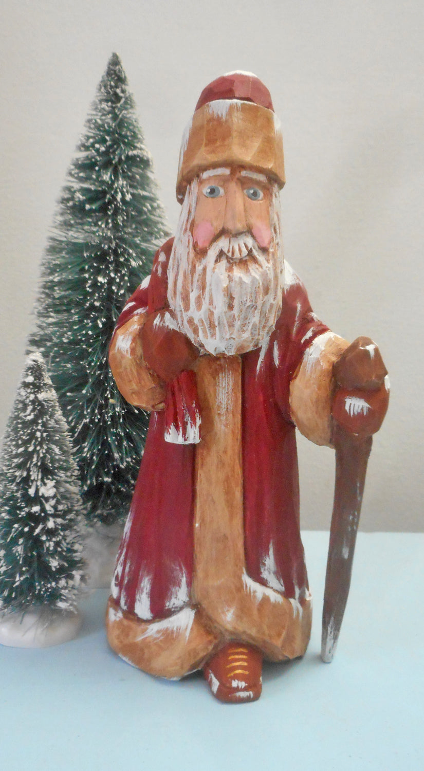 Robe Santa Claus with Christmas sack woodcarving