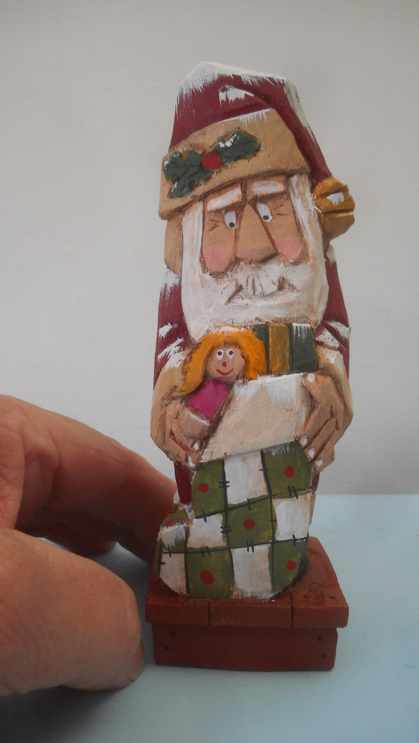 Santa Claus Wood Carving with Christmas Stocking