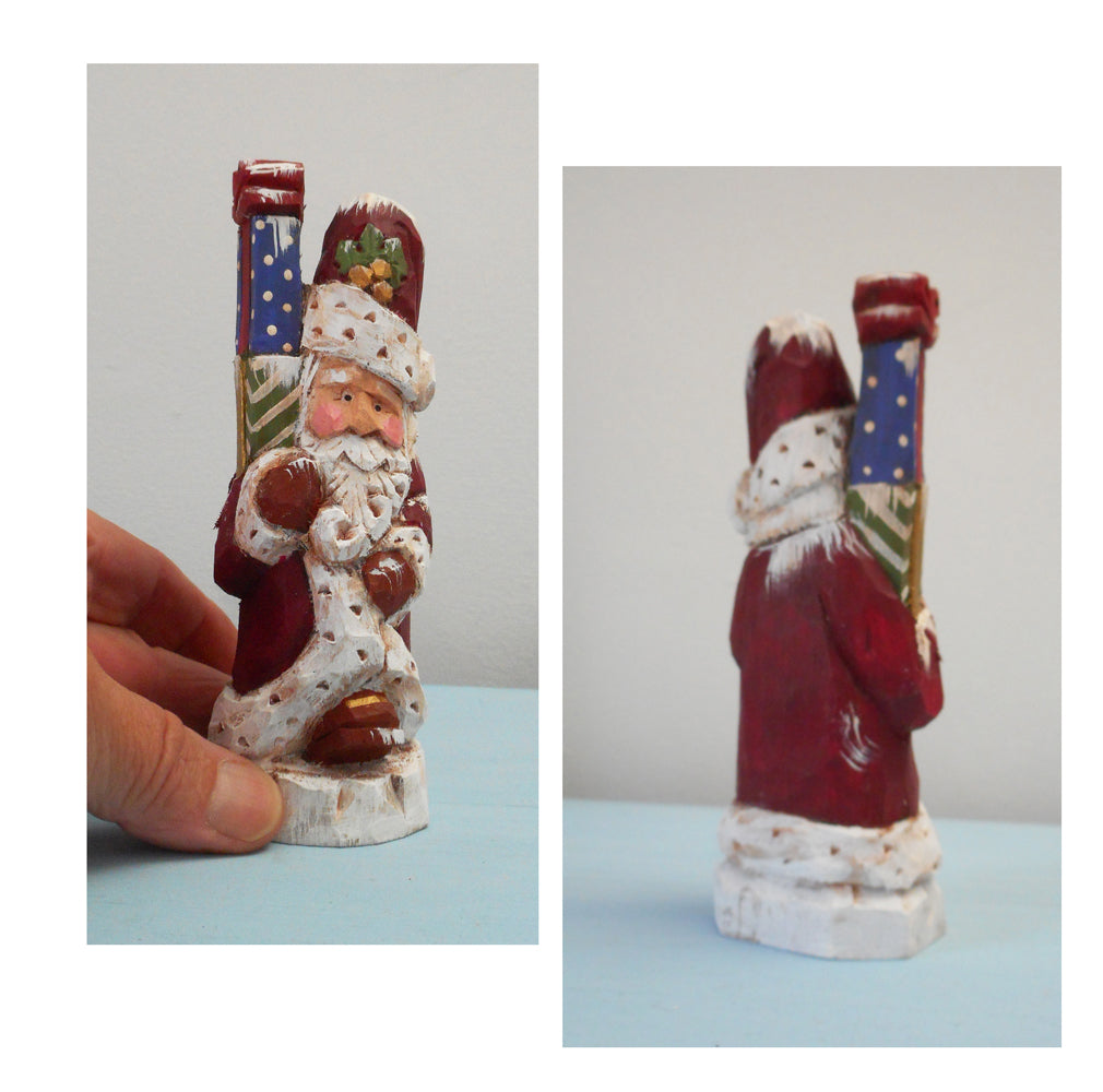 Traditional Santa Claus with Christmas package