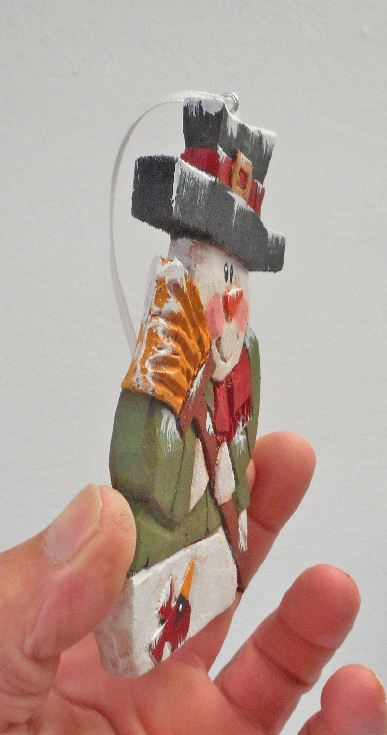 Wood snowman folk art ornament with cardinal