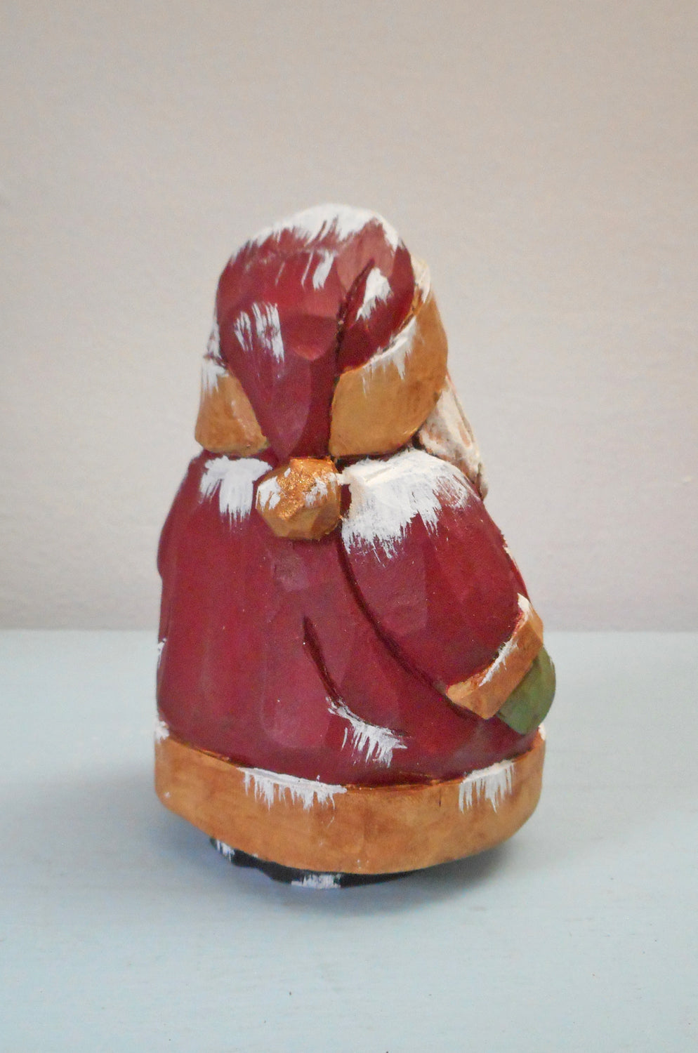 Wooden Chubby Santa Claus with doll