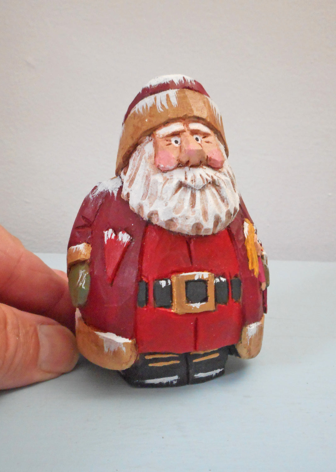 Wooden Chubby Santa Claus with doll