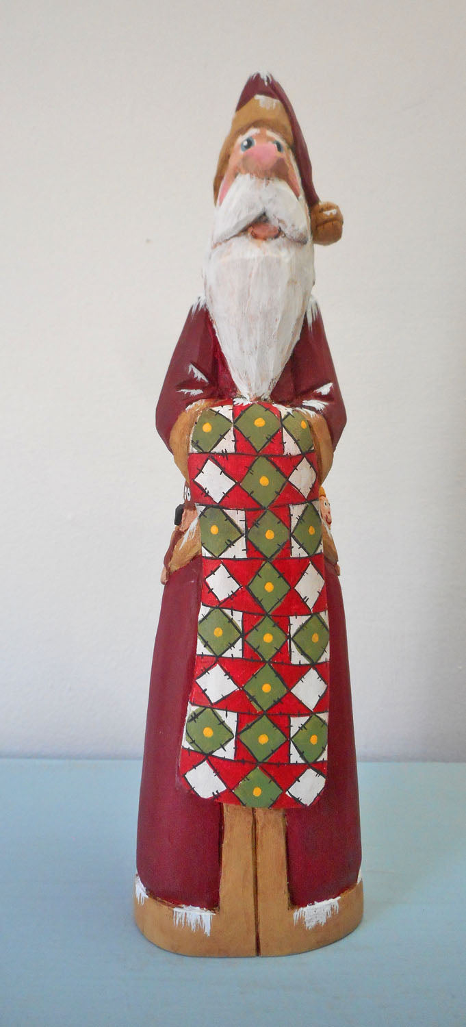 Hand Carved Father Christmas Santa with Quilt