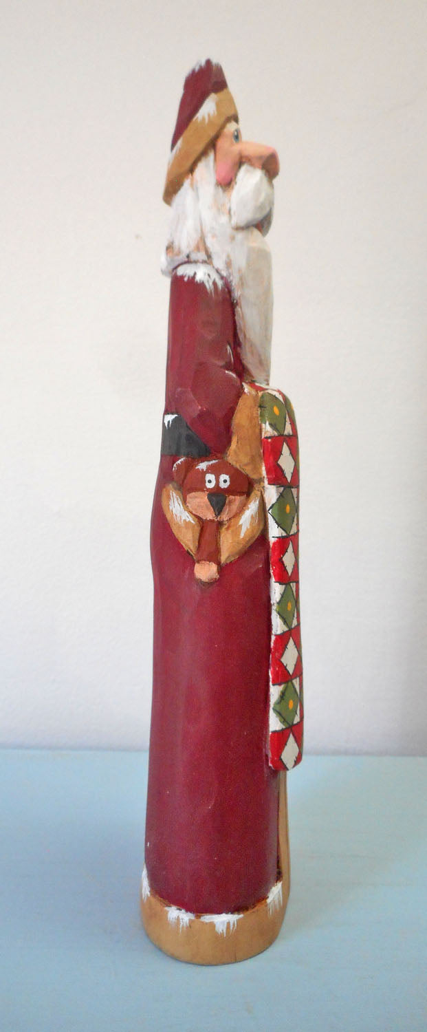 Hand Carved Father Christmas Santa with Quilt