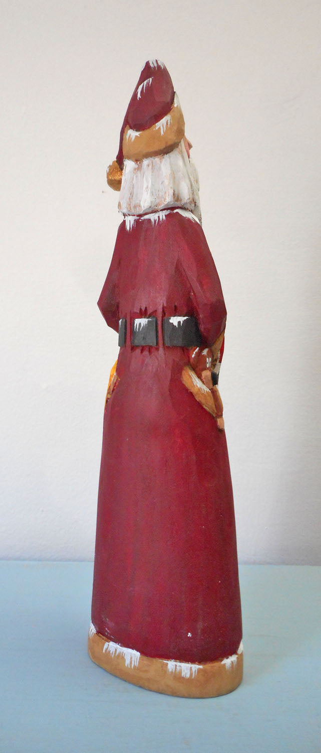 Hand Carved Father Christmas Santa with Quilt