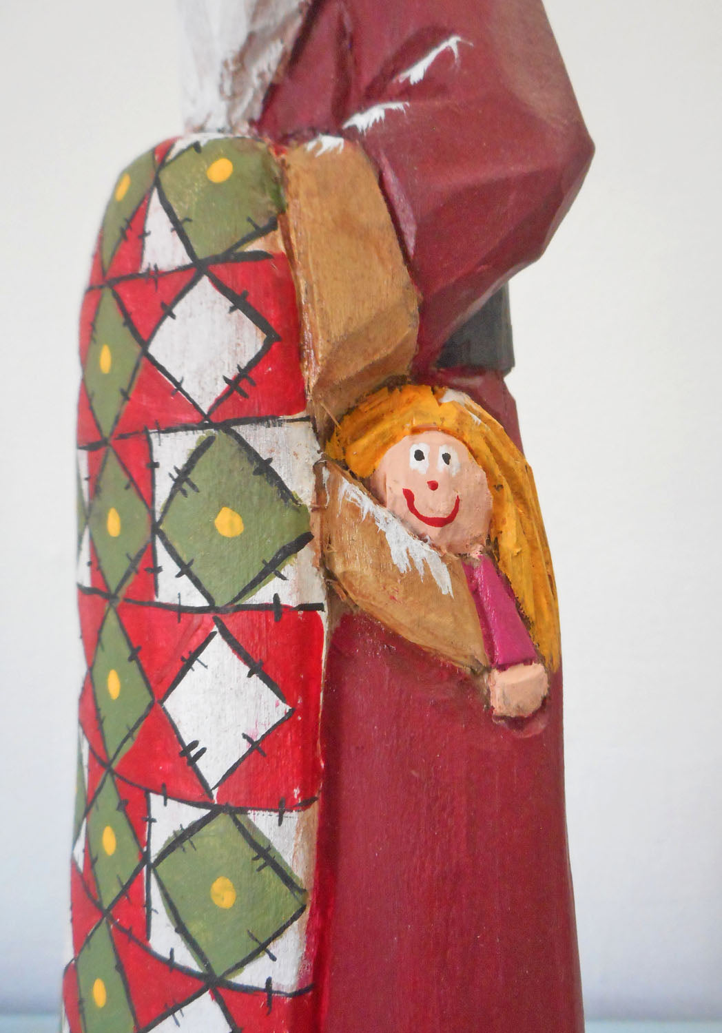 Hand Carved Father Christmas Santa with Quilt