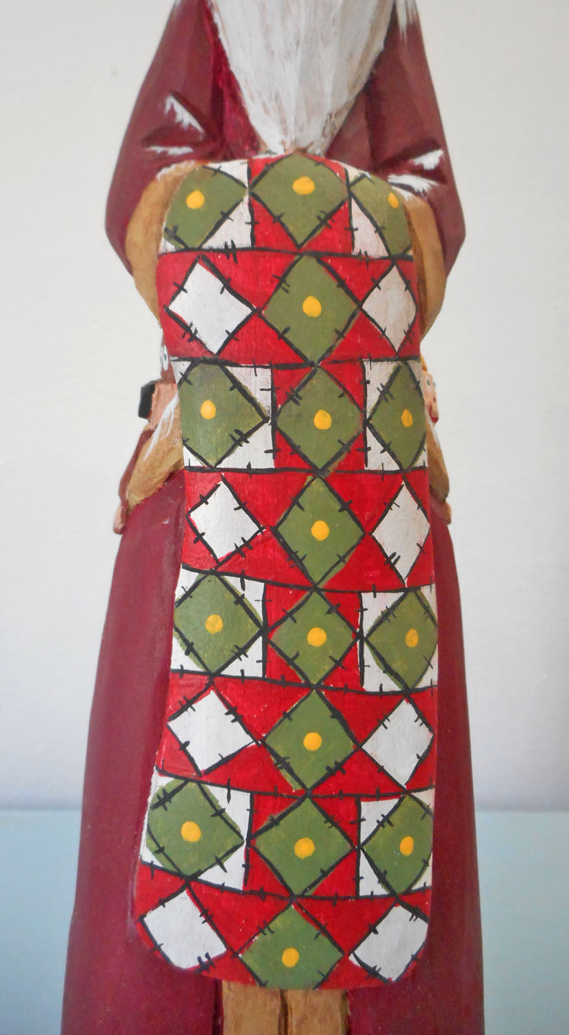Hand Carved Father Christmas Santa with Quilt