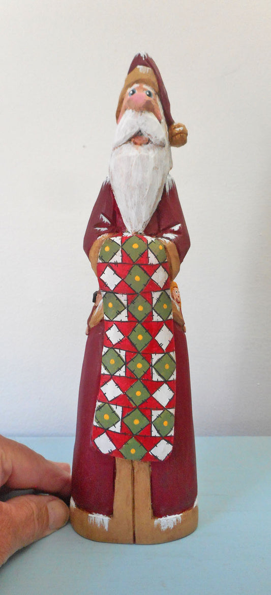 Hand Carved Father Christmas Santa with Quilt
