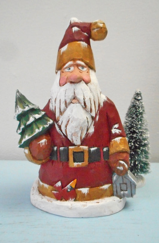 Santa Claus with Christmas tree