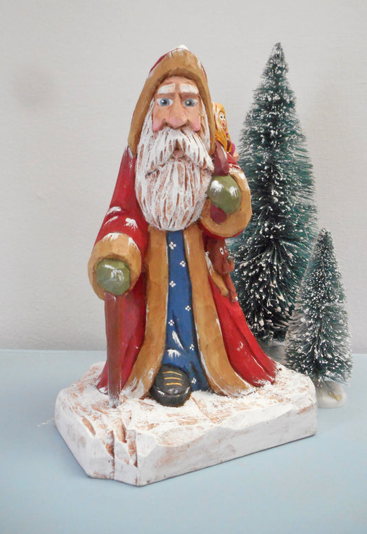 Robe Santa Claus with Christmas sack woodcarving
