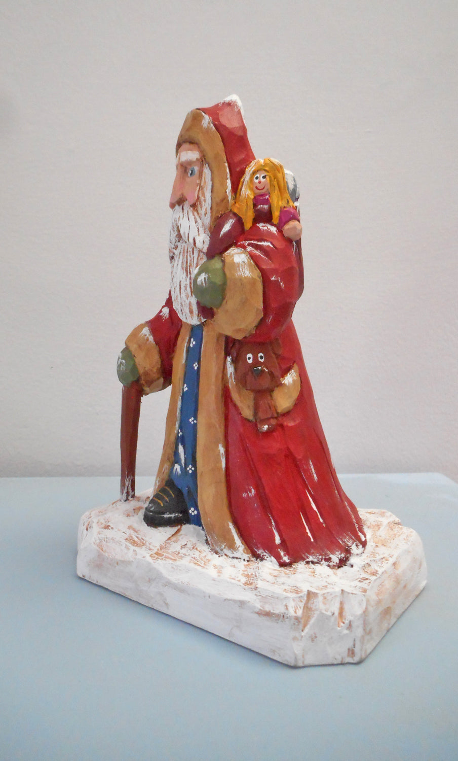 Robe Santa Claus with Christmas sack woodcarving