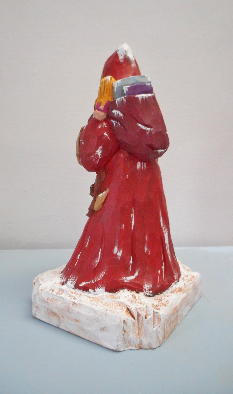Robe Santa Claus with Christmas sack woodcarving