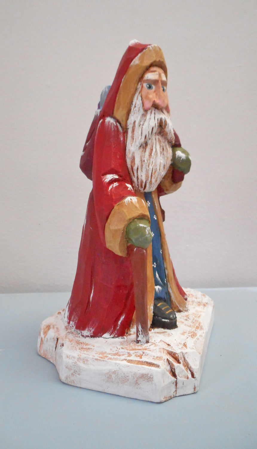 Robe Santa Claus with Christmas sack woodcarving