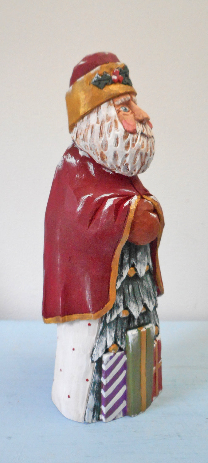 Hand Carved Santa Claus with packages