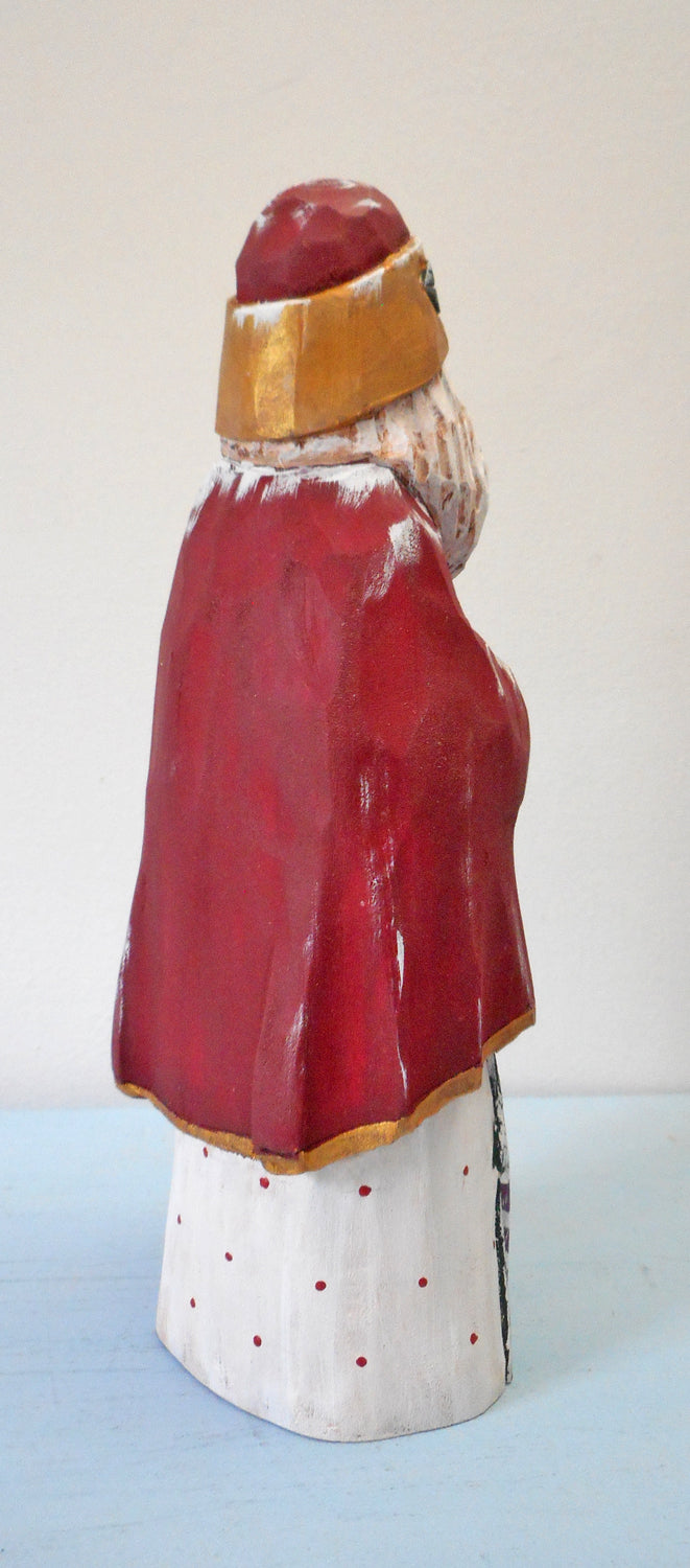 Hand Carved Santa Claus with packages