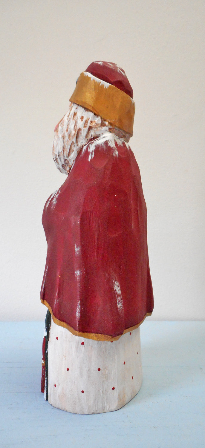Hand Carved Santa Claus with packages