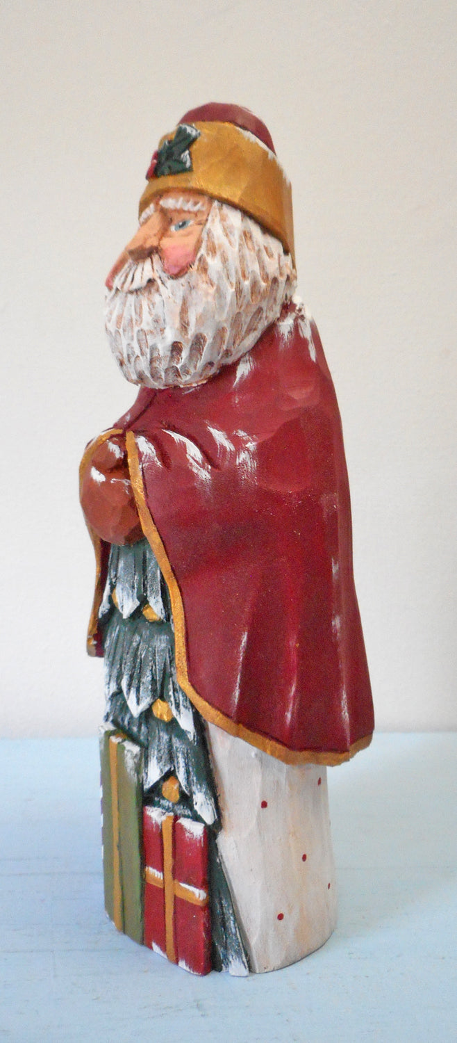 Hand Carved Santa Claus with packages