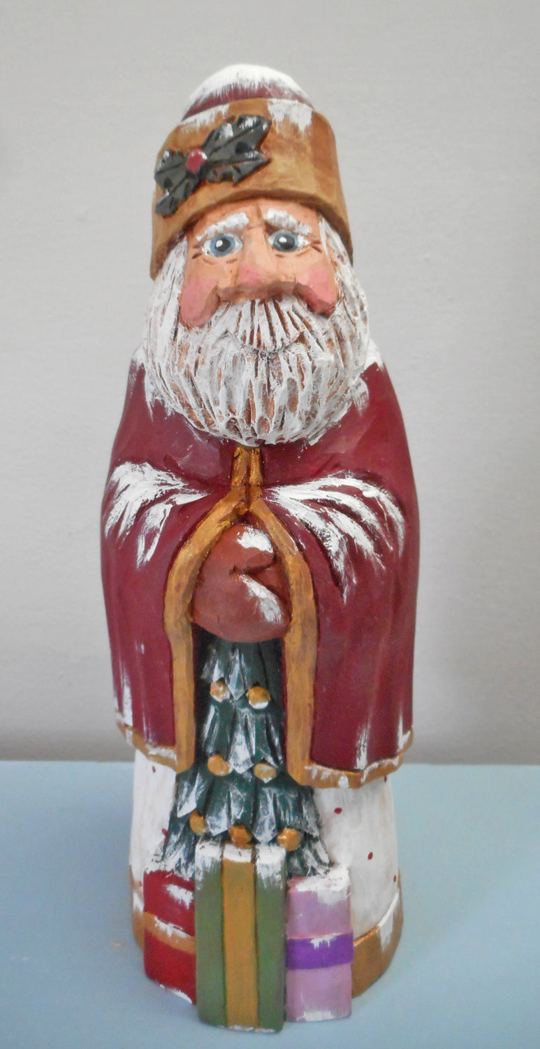 Hand Carved Santa Claus with packages