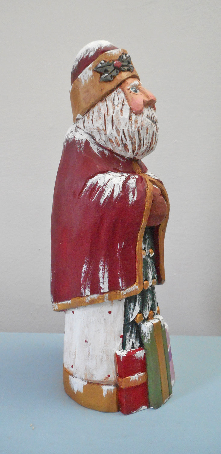 Hand Carved Santa Claus with packages