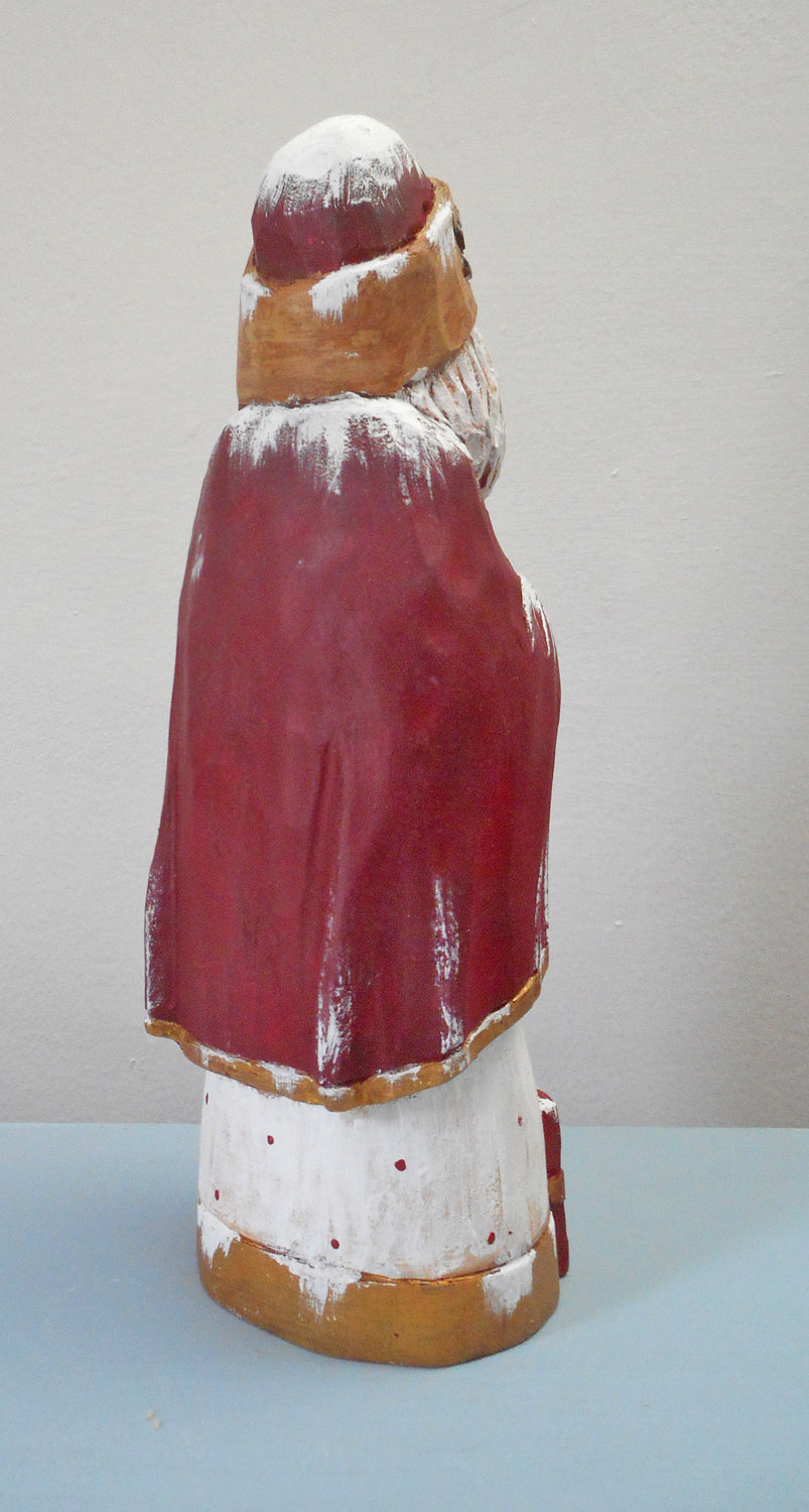 Hand Carved Santa Claus with packages