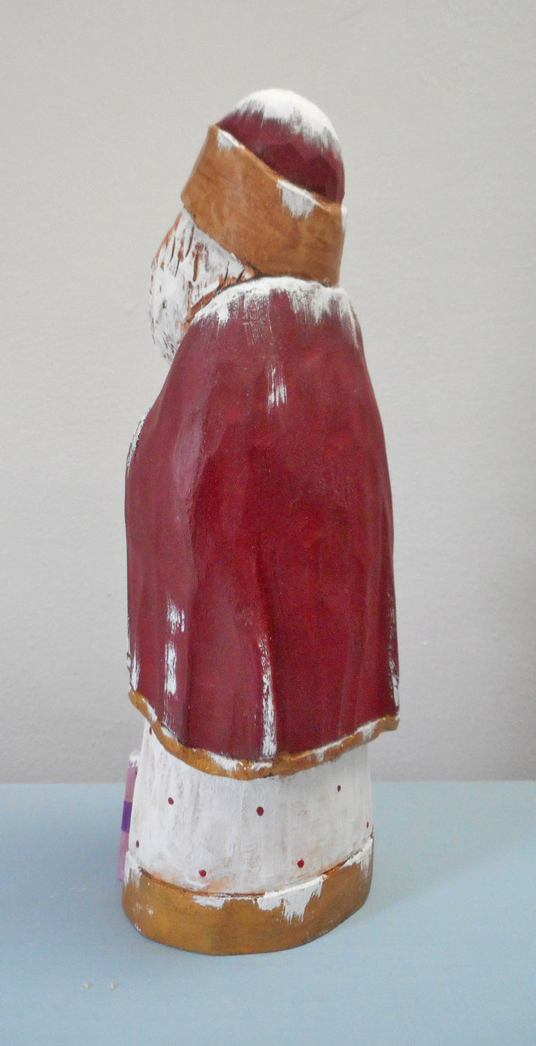 Hand Carved Santa Claus with packages