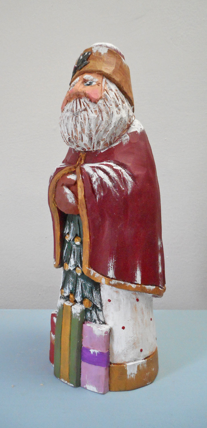 Hand Carved Santa Claus with packages