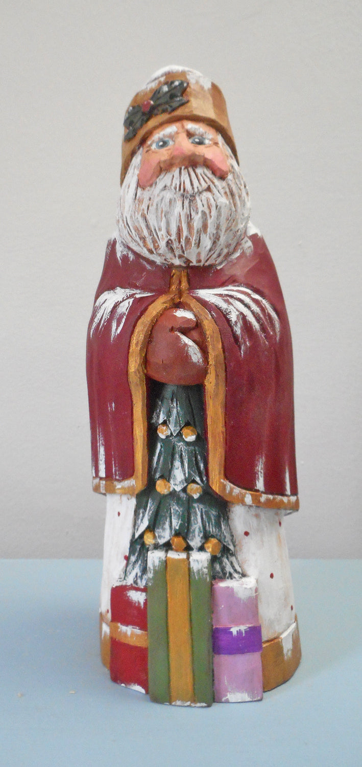 Hand Carved Santa Claus with packages