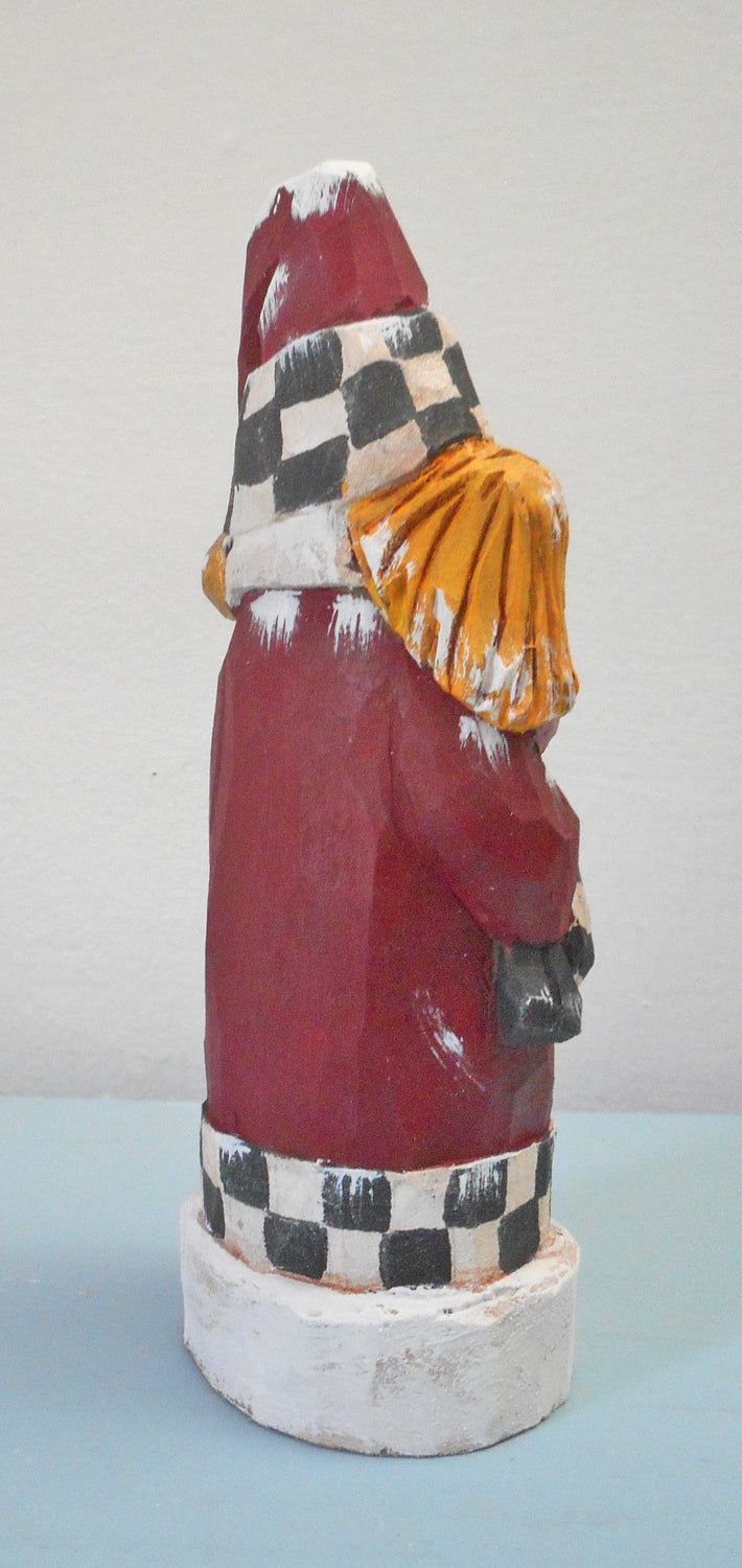 Hand carved Santa with child
