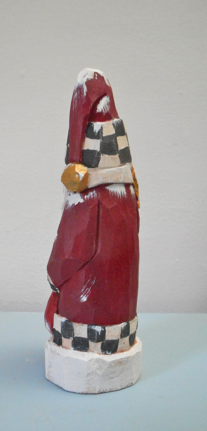 Hand carved Santa with child