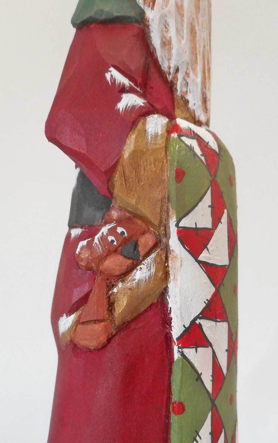 Hand Carved Father Christmas Santa with Quilt